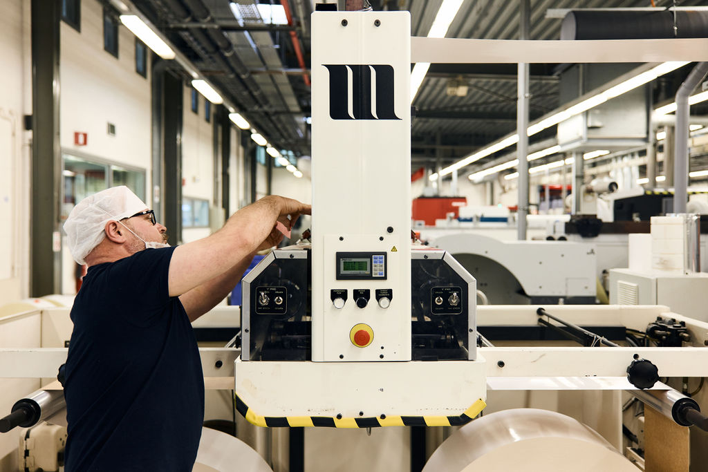 Reynders employee operating manufacturing equipment