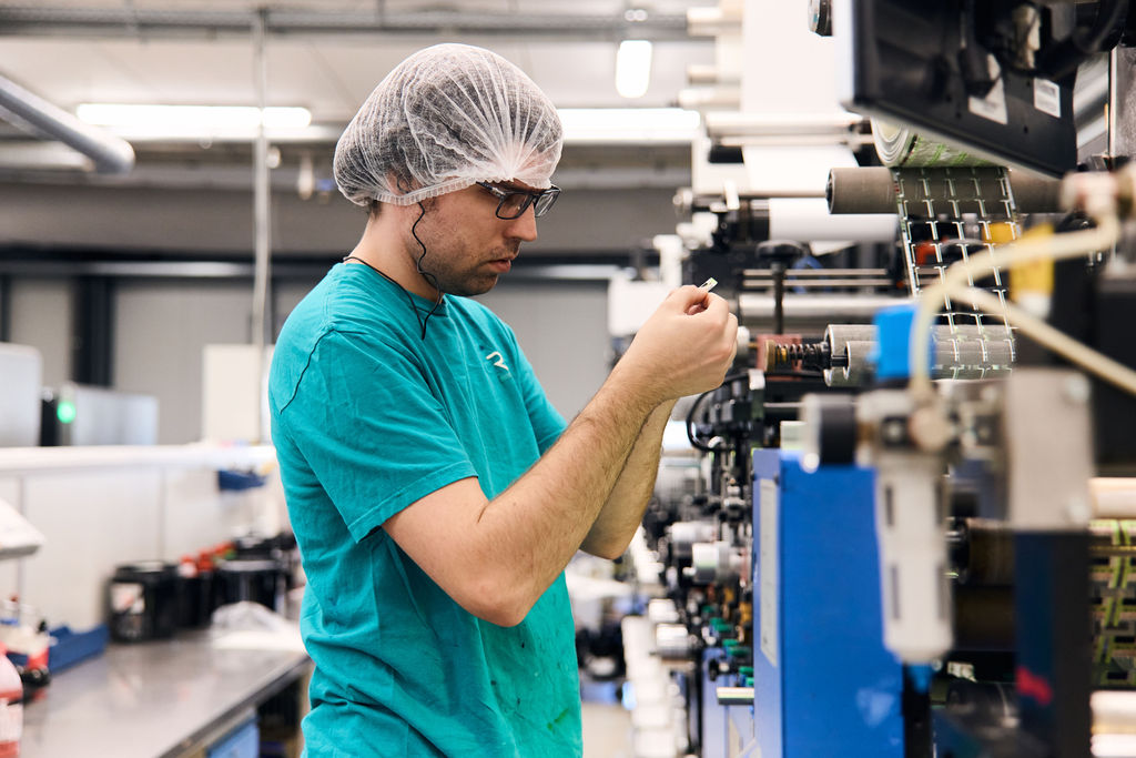 Reynders worker performing precision quality control